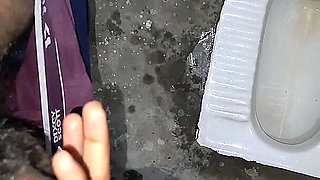 Desi Bhabhi Holding Stepbrother-in-law's Penis and Making Him Pee and Peeing Herself