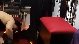 Busty Dominatrix Teases Bound Slave's Throbbing Cock in Dungeon