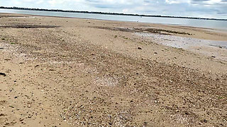 Stripping Naked Out of Mini Dress on Beach