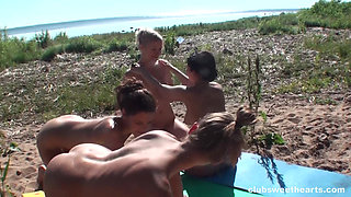 Sweet Lesbians Making Out on the Beach
