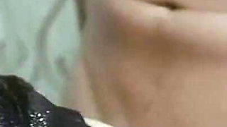 This Mature Woman Needs Two Cocks, One White and One Black.