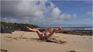 Nymph Plays Dildo On Public Beach