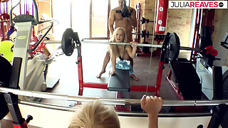 Blonde sucks cum off dick after riding it in the gym