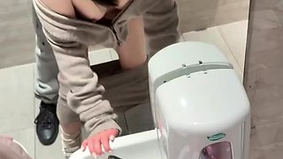 Gorgeous Asian girlfriend fucked doggystyle in public toilet