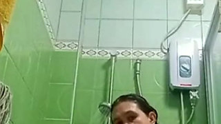 Assy taking a bath .i cum to her for seeing nude