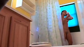 Stepdaughter 21 shaves pussy in shower (voyeur)