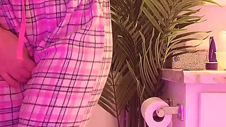 Emily pissing in the bathroom