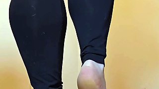 Flexible pale brunette with foot fetish does hot footjob