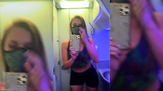 Busty MILF films herself masturbating in public toilet