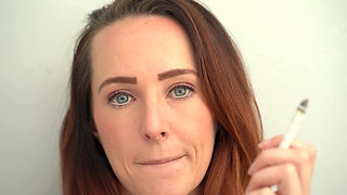 Extreme Close up Blue Eyed Redhead Smoking