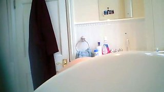 Blonde curvy stepmom peeped at in bathroom
