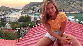 Cute teen gives bj on a rooftop - POV