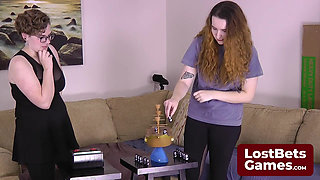 A sexy dynamic duo are playing a Strip Pirate Penguins game