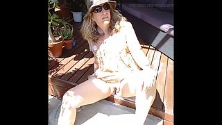 Mature Blonde Amateur Suns Her Bald Pink Pussy Outdoor Close Up Spread