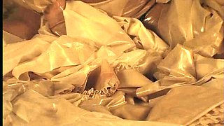 Big boobed Memphis masturbates in a bodystocking