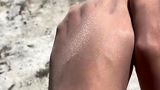 MILF in fishnet enjoys foot fetish
