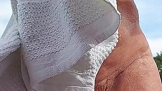 Sexy Granny Swims Naked in a Lake!
