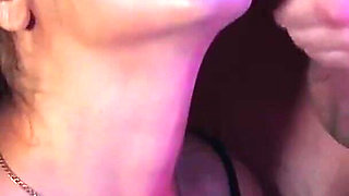 Oral slut sucks and lets him rub his cock in her face while playing PS