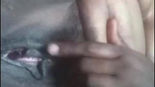 Aunty is oiling her pussy