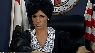 A super sexy brunette massages her big boobs