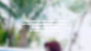 Woman Hijab Bathing Naked in an Open-air Hotel Pool