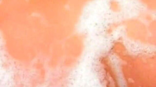 Seductive Brunette Babe Fingers Herself to Explosive Orgasm in Bathtub